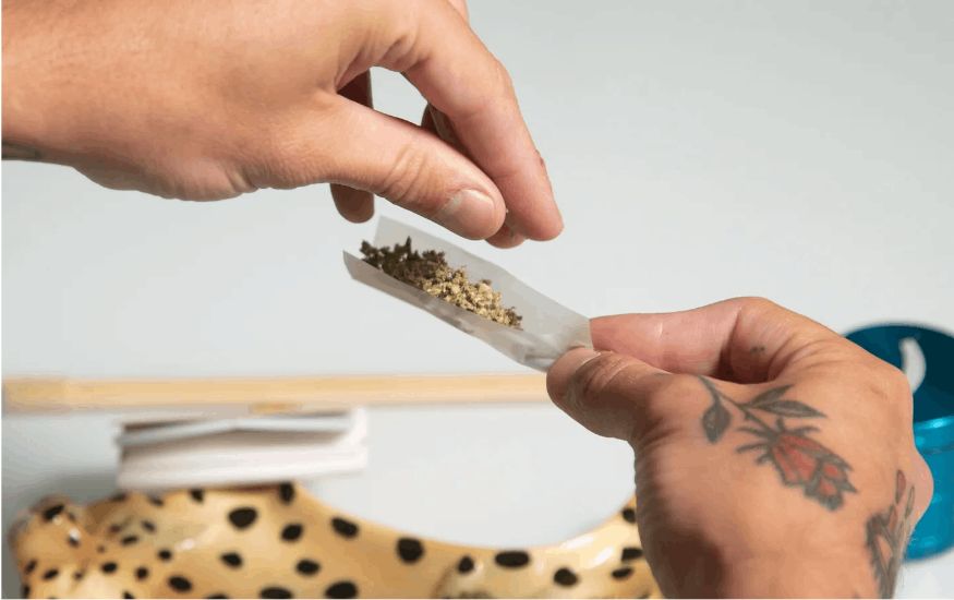 Place the ground cannabis evenly along the length of the rolling paper. Start by placing the ground weed at one end of the paper, leaving some space for tucking and sealing later.